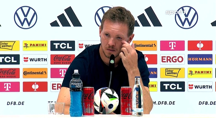 德国队遭淘汰后今日召开发布会，纳格尔斯曼强忍泪水控制情绪